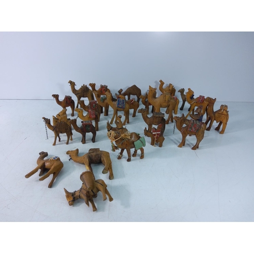 492 - Large qty of wooden camels