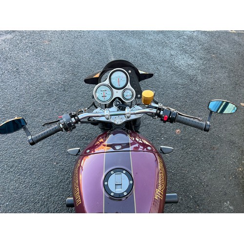 40 - 2000 Triumph Speed Triple 955i in a very eye catching purple and gold colour scheme. This bike has 2... 