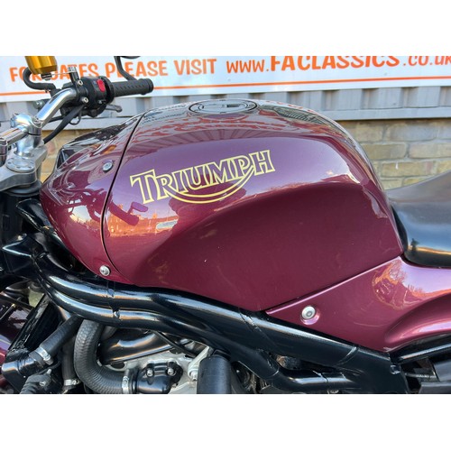 40 - 2000 Triumph Speed Triple 955i in a very eye catching purple and gold colour scheme. This bike has 2... 