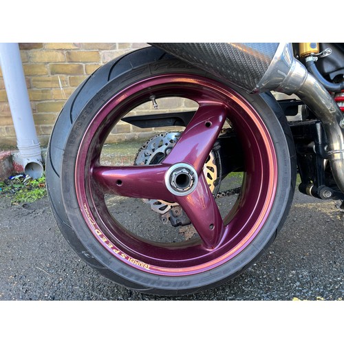 40 - 2000 Triumph Speed Triple 955i in a very eye catching purple and gold colour scheme. This bike has 2... 