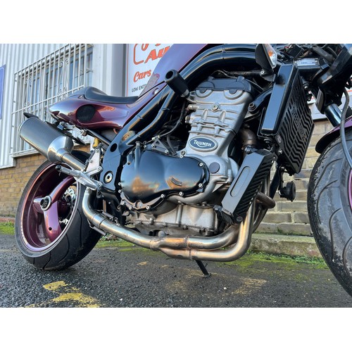 40 - 2000 Triumph Speed Triple 955i in a very eye catching purple and gold colour scheme. This bike has 2... 