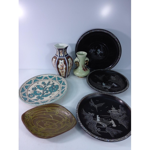 203 - Oriental inlaid black lacquered plates, vases and other porcelain pieces