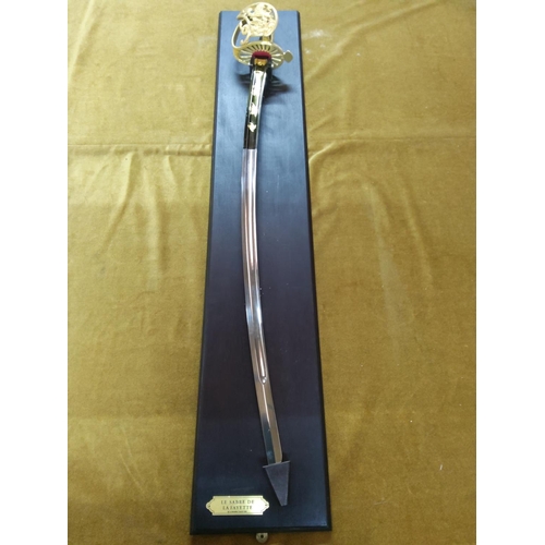 113 - Wooden mounted Franklin mint 'Le Sabre De La Fayette' sword, approx 110cms