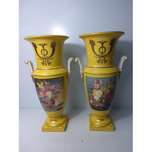 129 - Pair of yellow porcelain vases with floral decoration (Sevres style), height 46cms