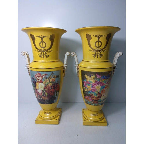 129 - Pair of yellow porcelain vases with floral decoration (Sevres style), height 46cms