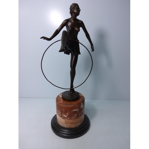 134 - Cast bronze art deco dancing girl with hoop on marble base, height 48cms