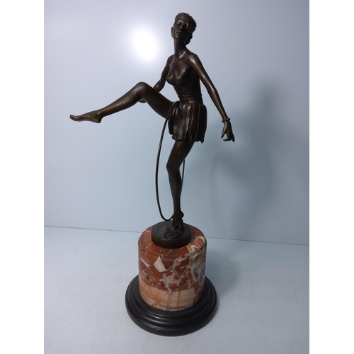 134 - Cast bronze art deco dancing girl with hoop on marble base, height 48cms