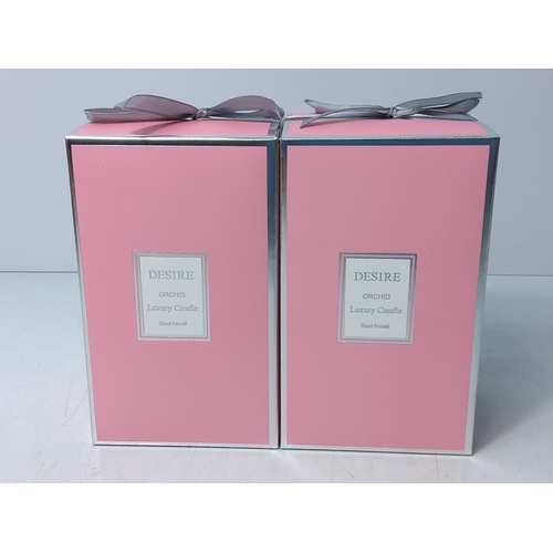 136 - Pair of boxed orchid candles