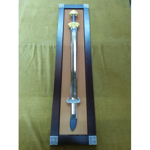 144 - Franklin Mint wooden mounted sword with Viking decoration, approx 118cms