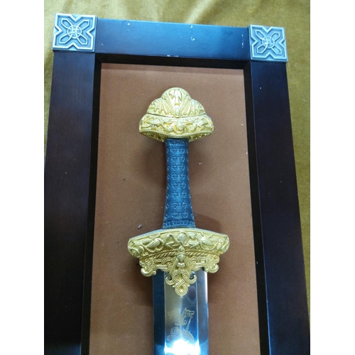 144 - Franklin Mint wooden mounted sword with Viking decoration, approx 118cms