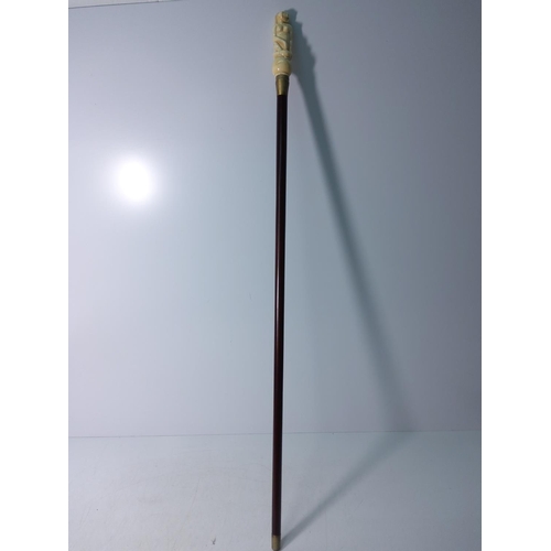 165 - Bone handled walking stick in the form of a nude lady