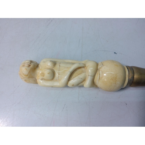 165 - Bone handled walking stick in the form of a nude lady