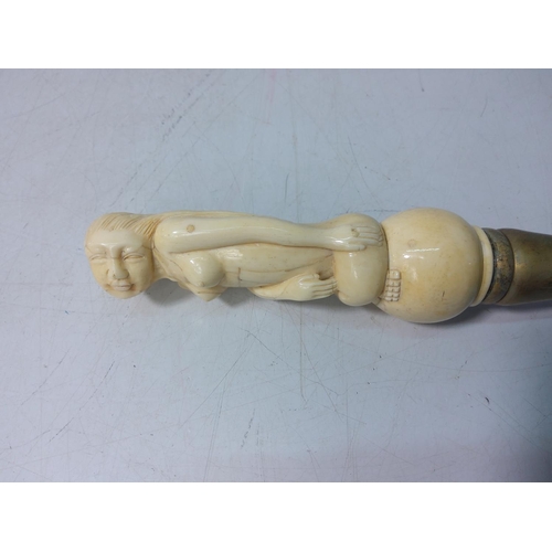 165 - Bone handled walking stick in the form of a nude lady