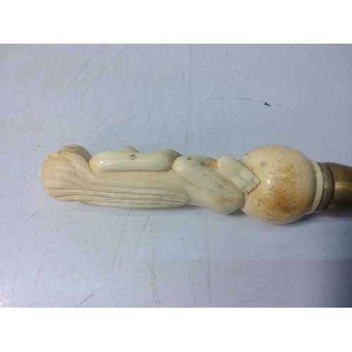 165 - Bone handled walking stick in the form of a nude lady