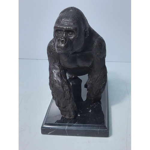 167 - Cast bronze gorilla on marble base, 19 x 20cms