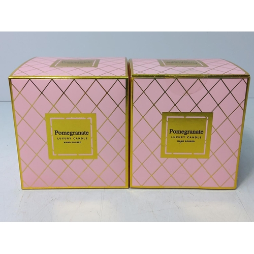 169 - 2 new and boxed pomegranate candles