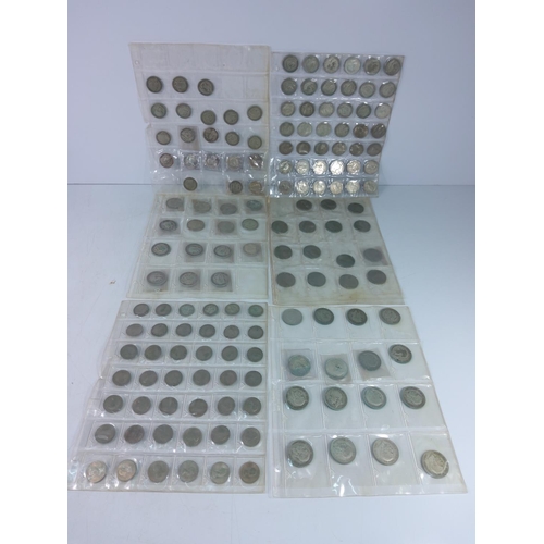 273 - 7 plastic leaves of coins including silver amnd half silver