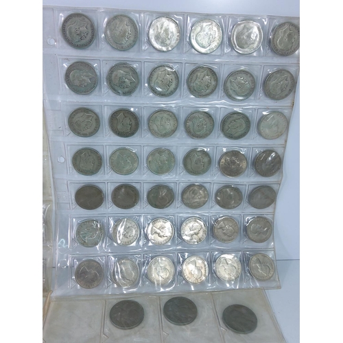 273 - 7 plastic leaves of coins including silver amnd half silver