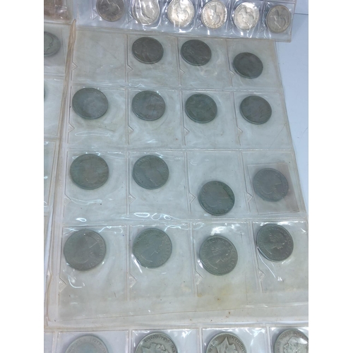 273 - 7 plastic leaves of coins including silver amnd half silver