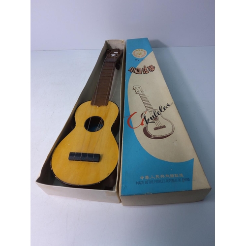 18 - Boxed childs ukulele