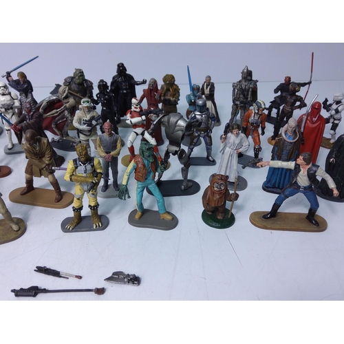 317 - 50 die cast Star Wars figures in a Star Wars bag