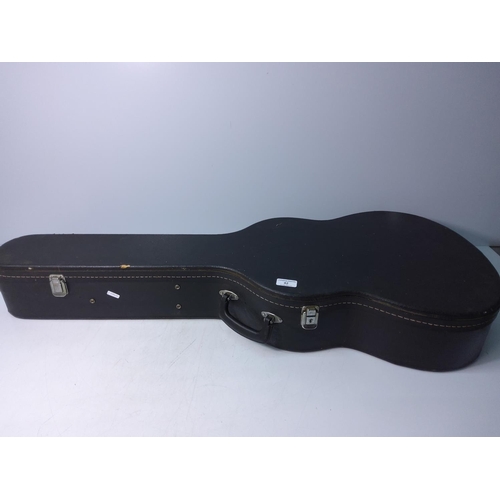 42 - Cased acoustic guitar