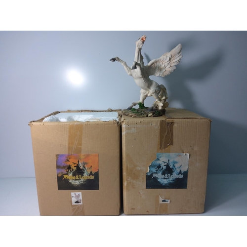 43 - 2 boxed and one unboxed pegasus figures