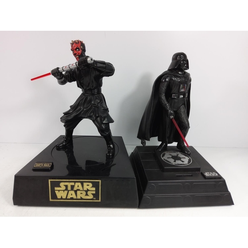 11 - 2 Star Wars figures/money boxes on plinths