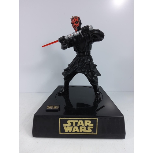 11 - 2 Star Wars figures/money boxes on plinths