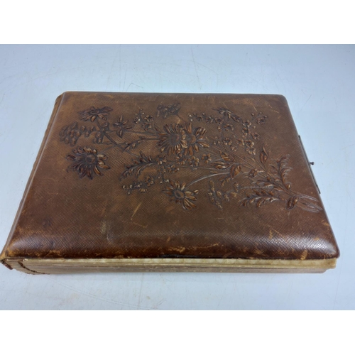 143 - Victorian photograph album and contents