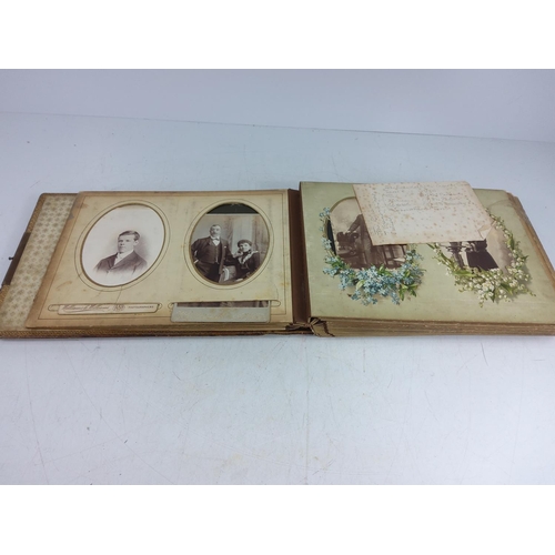 143 - Victorian photograph album and contents