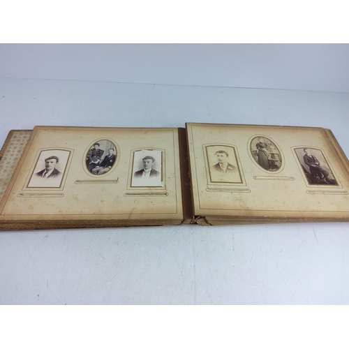 143 - Victorian photograph album and contents