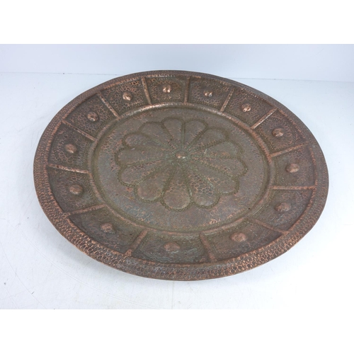 155 - Large planished copper wall charger signed by F.Cunha and dated 95 to the back, approx 49cms in diam... 