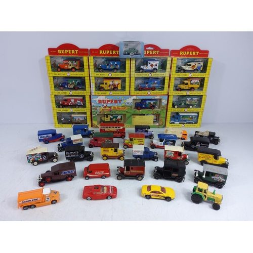 50 - Boxed Rupert model vehicles and qty of unboxed model vehicles