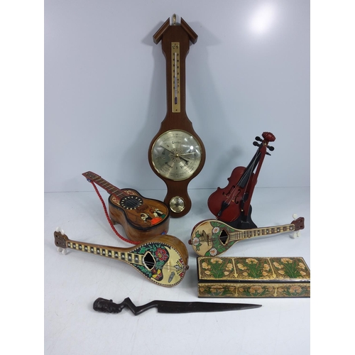 7 - Barometer, wooden instruments etc