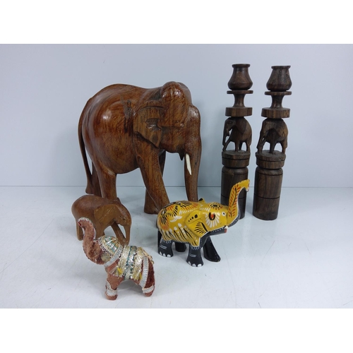 8 - Elephant carvings plus one fabric elephant