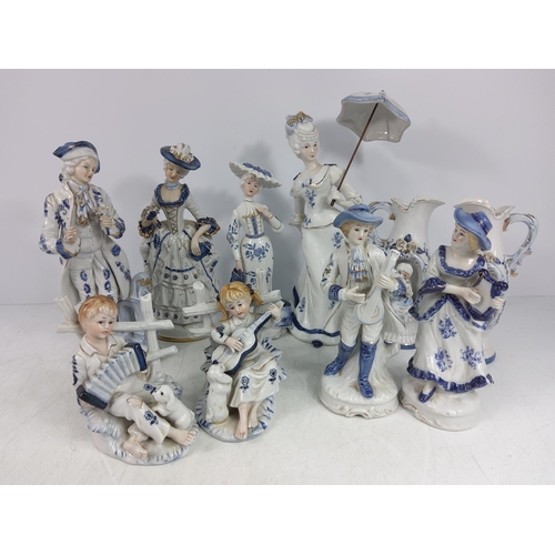 253 - Large qty of various blue and white figures, jugs and ornaments