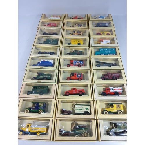 35 - 30 boxed model vehicles