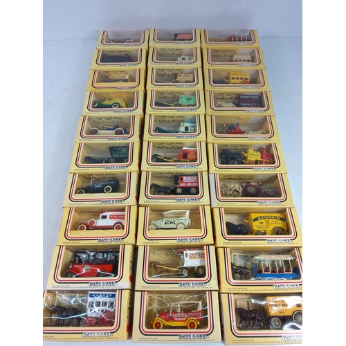 41 - 30 boxed model vehicles