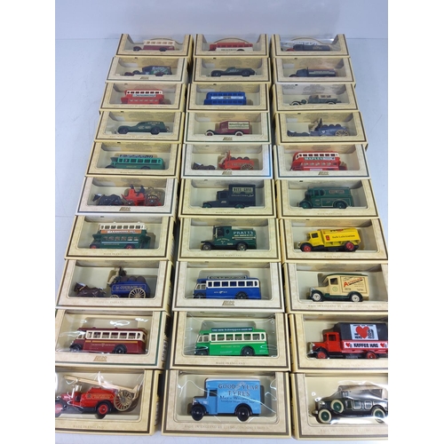 42 - 30 boxed model vehicles