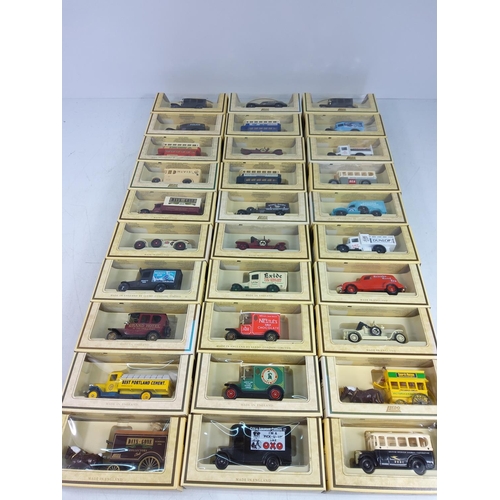 46 - 30 boxed model vehicles