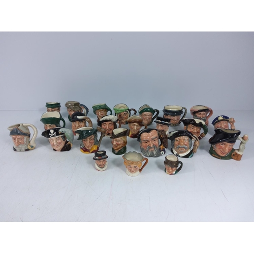 56 - 24 miniature Doulton Toby jugs