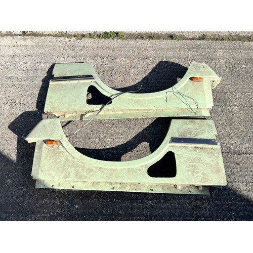 11 - Very large quantity of Classic Land Rover body panels including, quarter panels, wings, and other bo... 