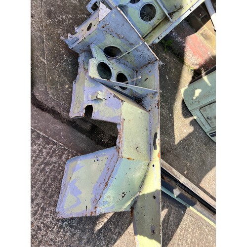 11 - Very large quantity of Classic Land Rover body panels including, quarter panels, wings, and other bo... 