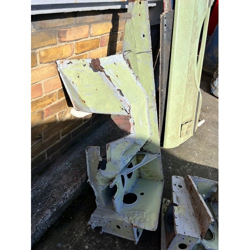 11 - Very large quantity of Classic Land Rover body panels including, quarter panels, wings, and other bo... 