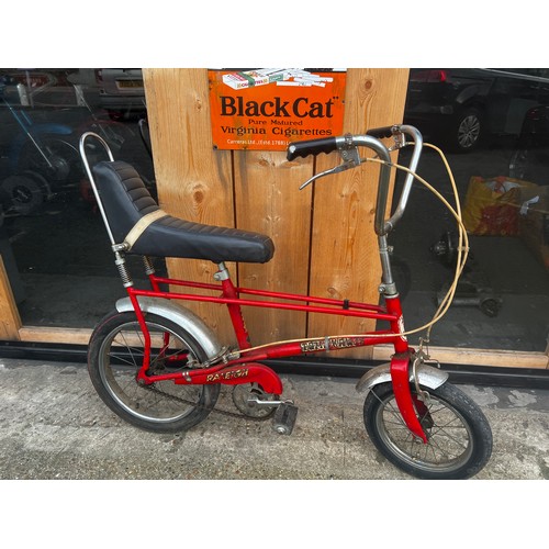 34 - Red Tomahawk cycle, in fair condition, needs a little tlc but good condition for its age. will make ... 