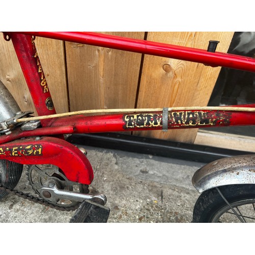 34 - Red Tomahawk cycle, in fair condition, needs a little tlc but good condition for its age. will make ... 