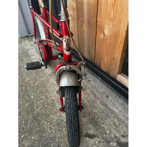 34 - Red Tomahawk cycle, in fair condition, needs a little tlc but good condition for its age. will make ... 