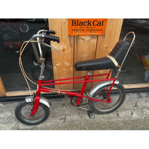 34 - Red Tomahawk cycle, in fair condition, needs a little tlc but good condition for its age. will make ... 