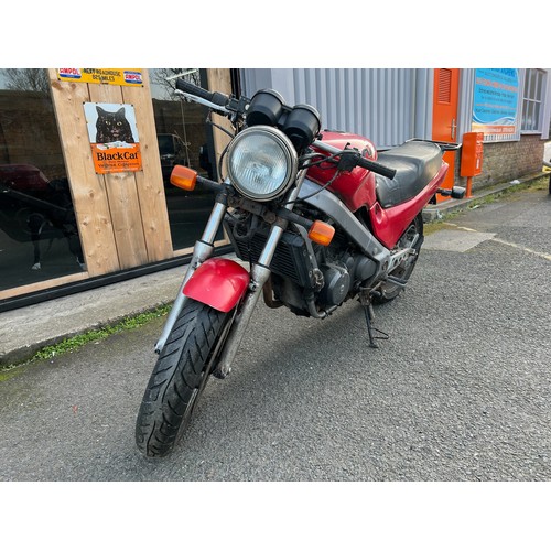 33 - Red Honda NTV registration P699TGN, 80485 miles on the clock this motorbike is a restoration piece, ... 